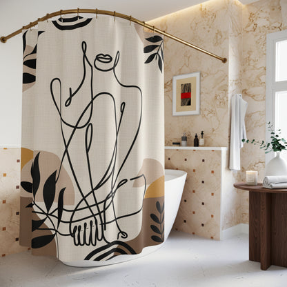 A beige shower curtain with a minimalist black line art design of a seated figure and abstract leaf motifs, hanging in a bright, modern white bathroom.