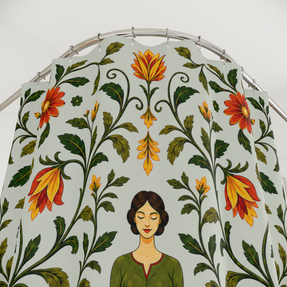A large fabric canopy or tent panel with a folk-art floral pattern and a stylized woman's face at the bottom, hanging from a metal curved frame against a plain white wall.